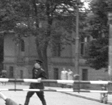 Enlargement of The House at the Bridge in the background with two Kinderwochenheim teachers visible.