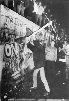 A photograph of the Berlin Wall the night it came down.
